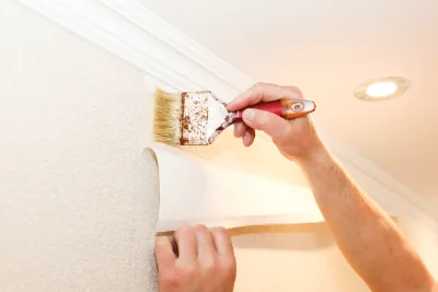 Pose de papier peint à Oô — revêtements muraux et toiles de verre